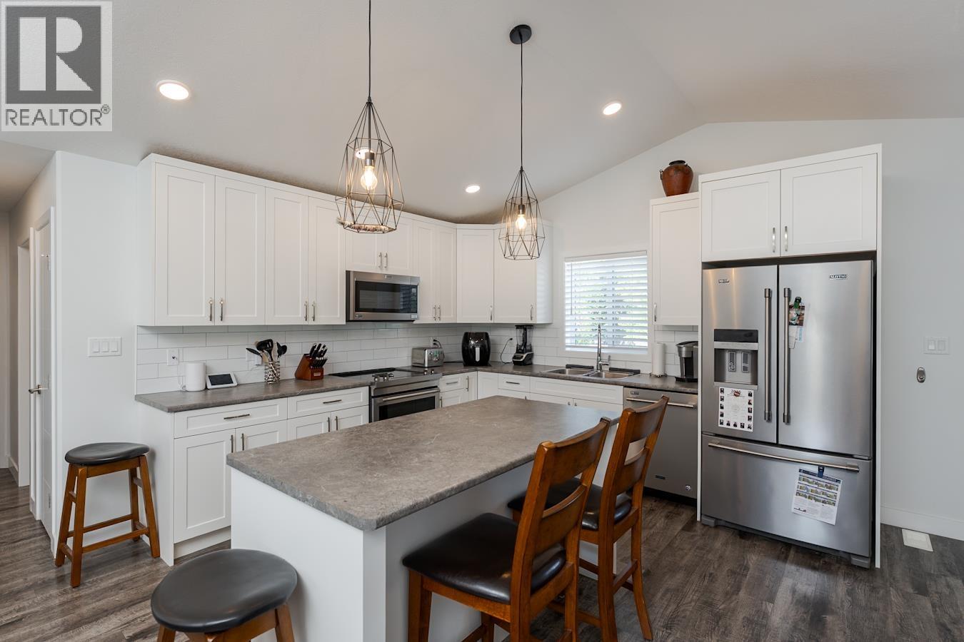Primary bedroom of 7034 HILLU ROAD · Prince George, BC