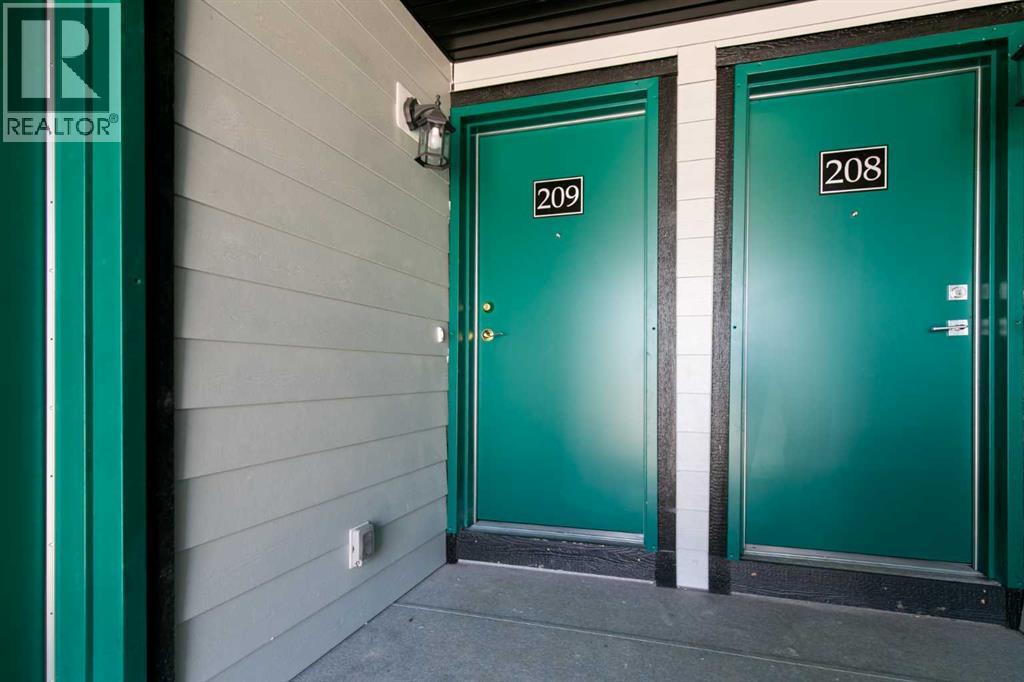 Unit 209 - Your new home awaits behind this charming green door!