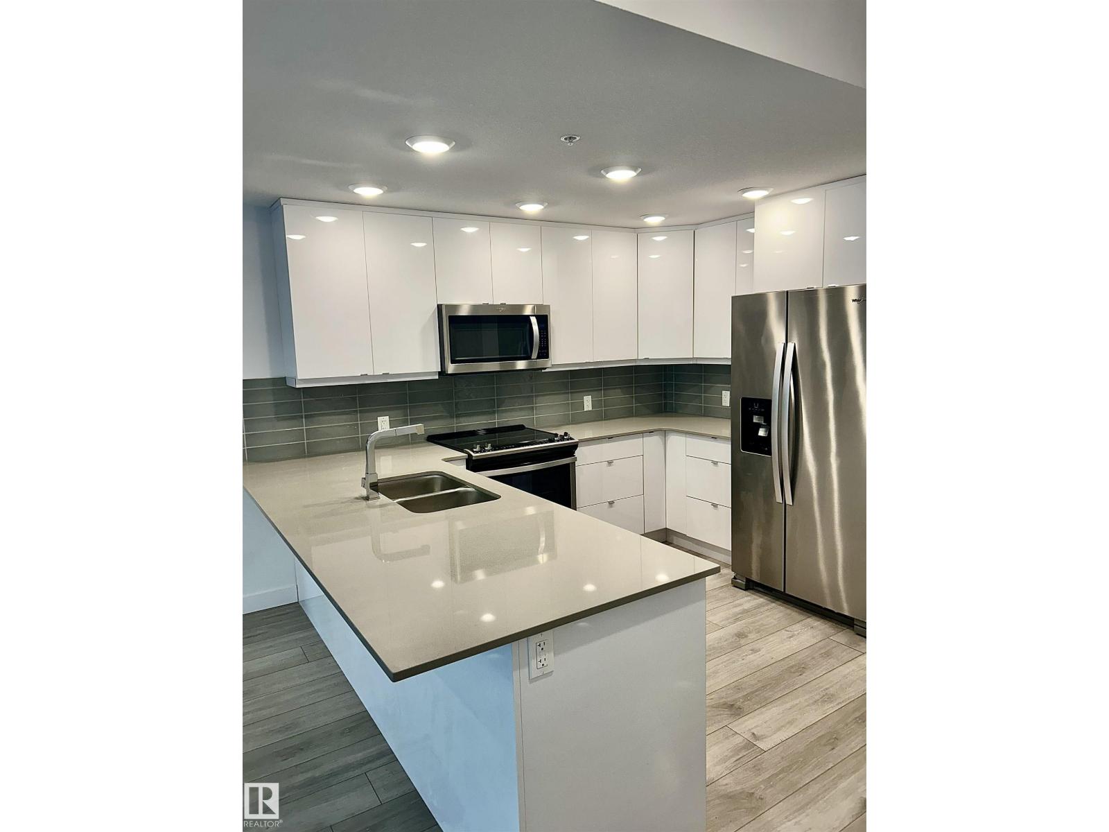#203 8510 90 ST NW - 4