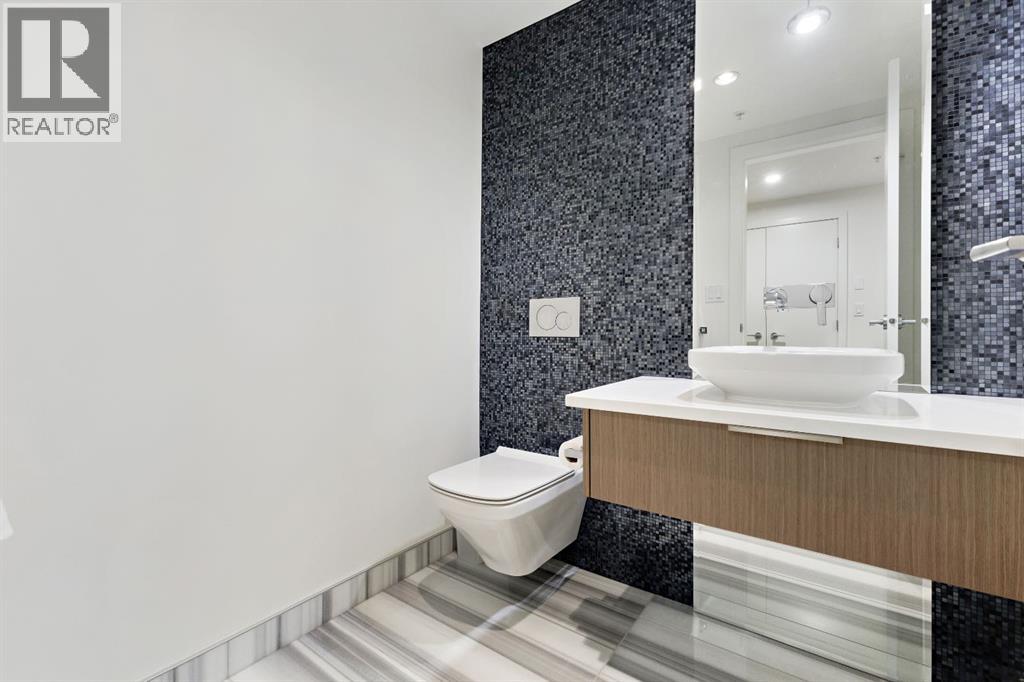 #104 128 Waterfront Court SW - 24