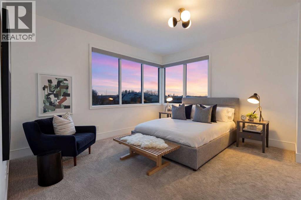 Upper level bedroom #2 with ensuite and walk-in closet