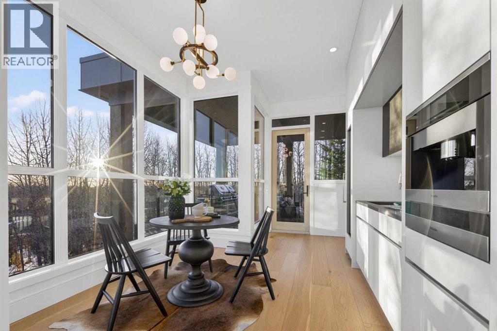 Breakfast nook behind the kitchen, in the ideal location to soak in stunning sunrises with a coffee