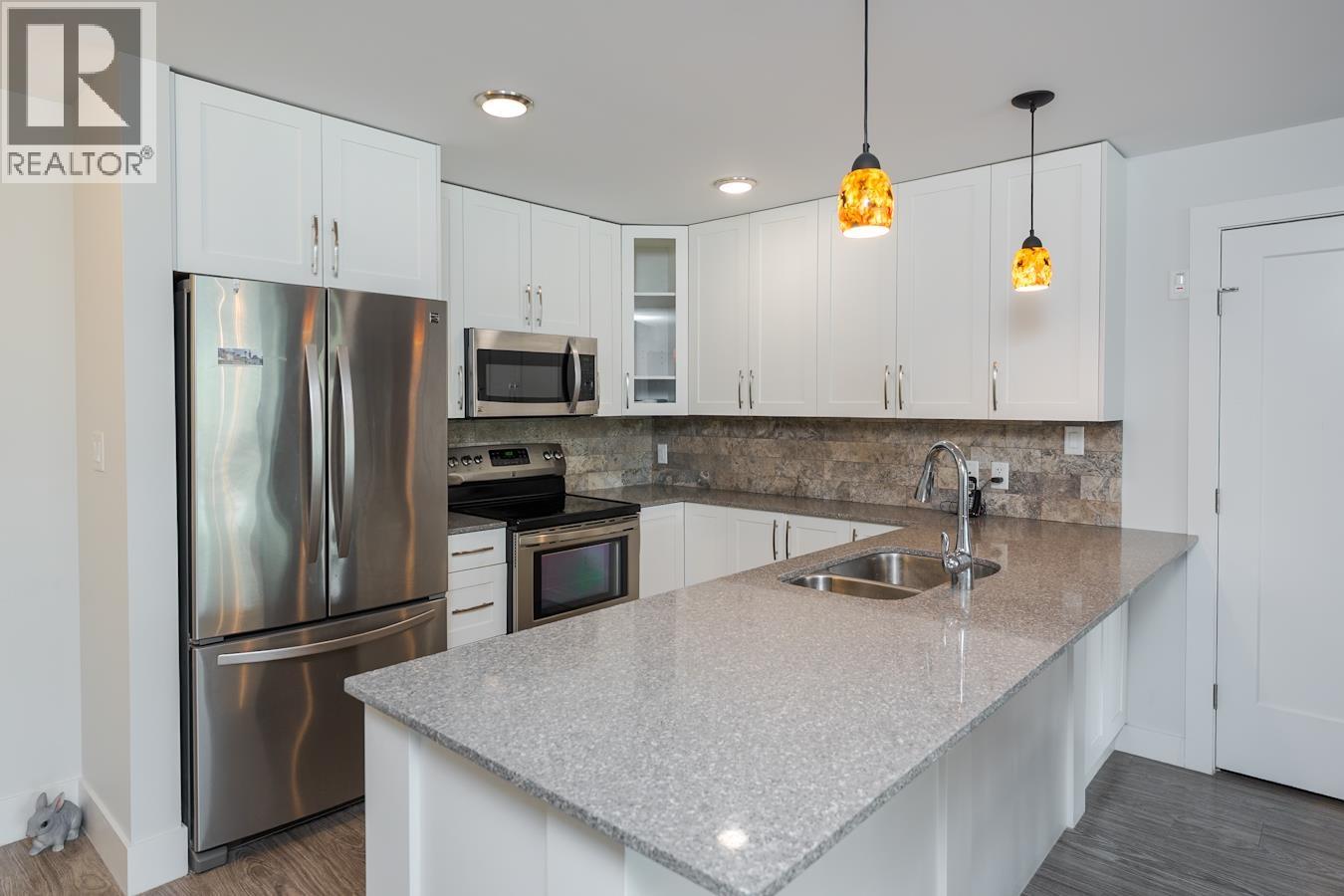 Photo 11 of 35 — 221 2055 INGLEDEW STREET · Prince George, BC