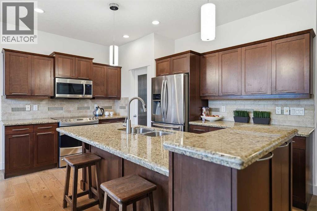 114 Cougarstone Crescent SW — photo 15