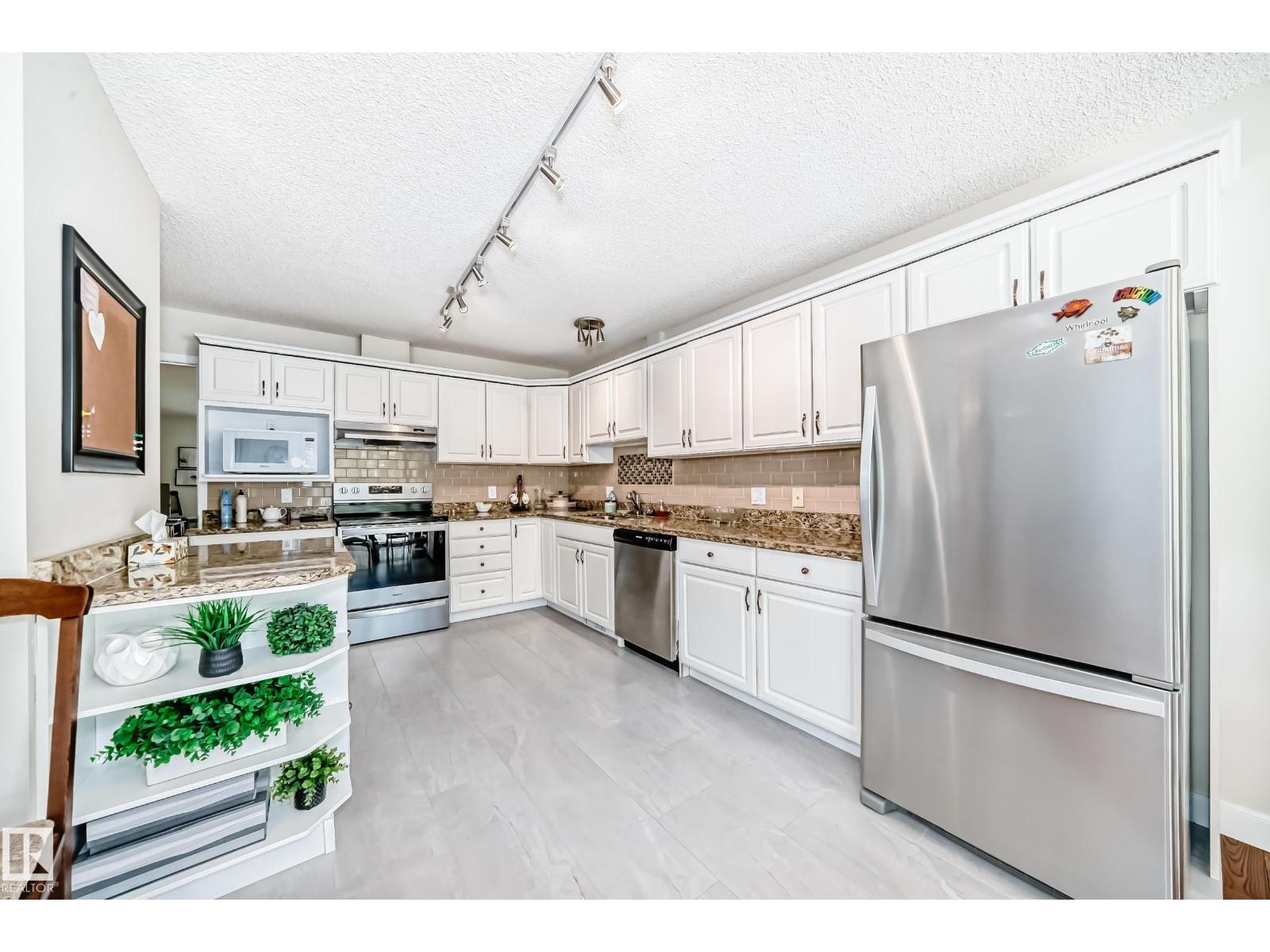 #50 303 TWIN BROOKS DR NW NW — photo 12