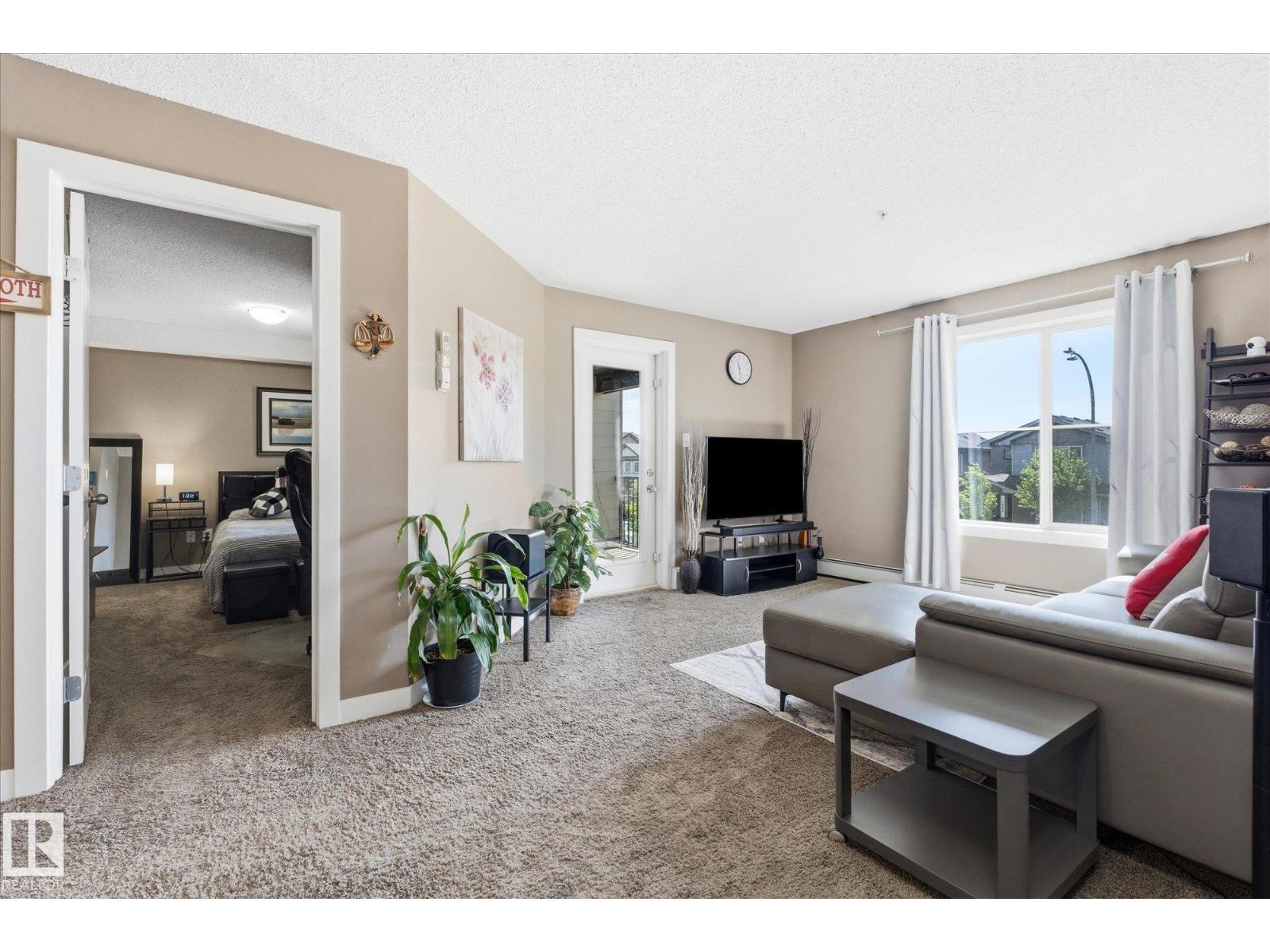 #208 1080 MCCONACHIE BV NW — photo 12