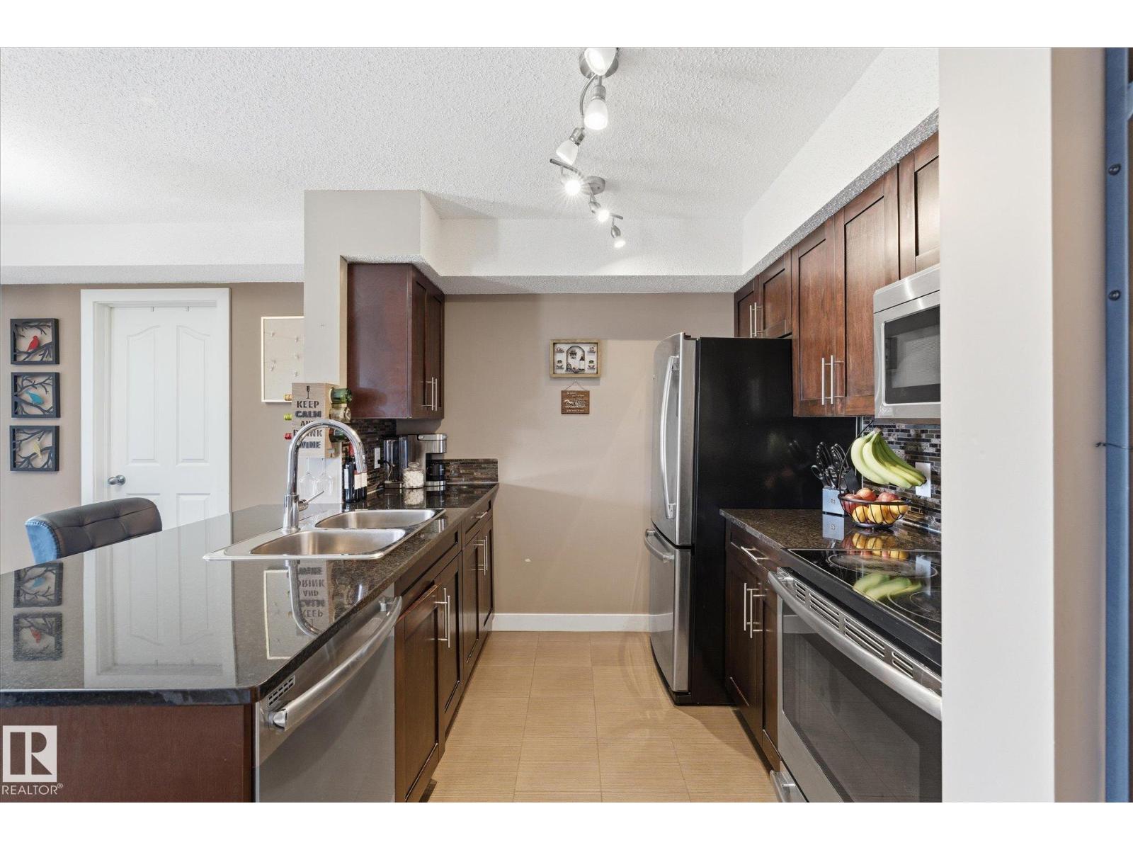 #208 1080 MCCONACHIE BV NW — photo 7