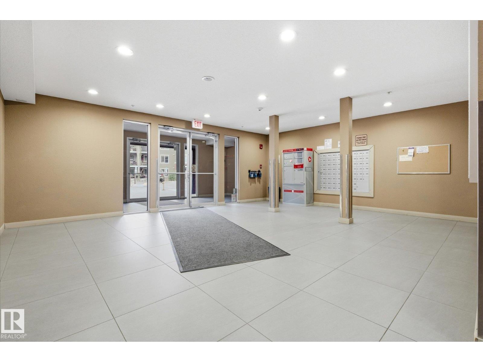 #208 1080 MCCONACHIE BV NW — photo 38
