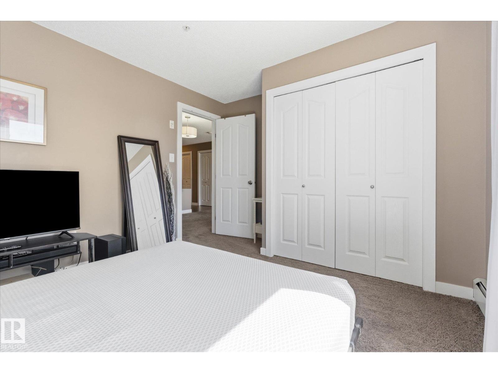 #208 1080 MCCONACHIE BV NW — photo 23