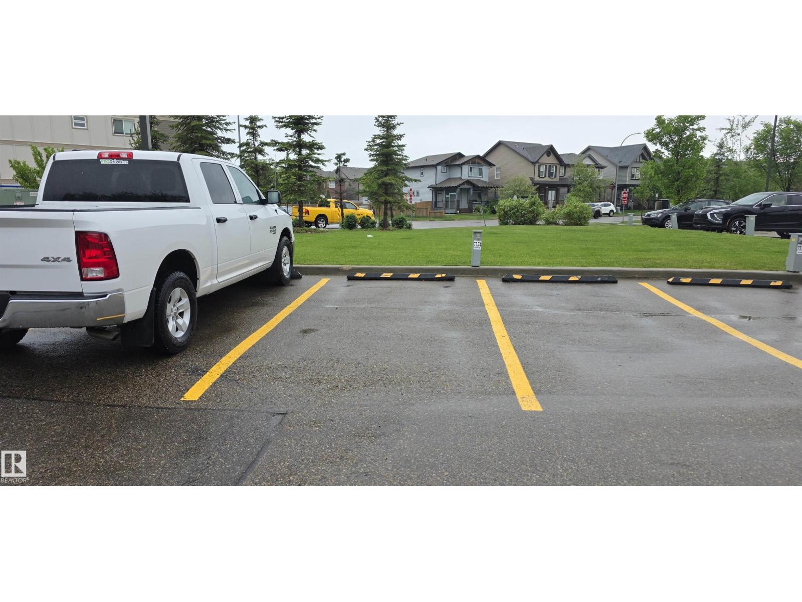 #208 1080 MCCONACHIE BV NW — photo 35