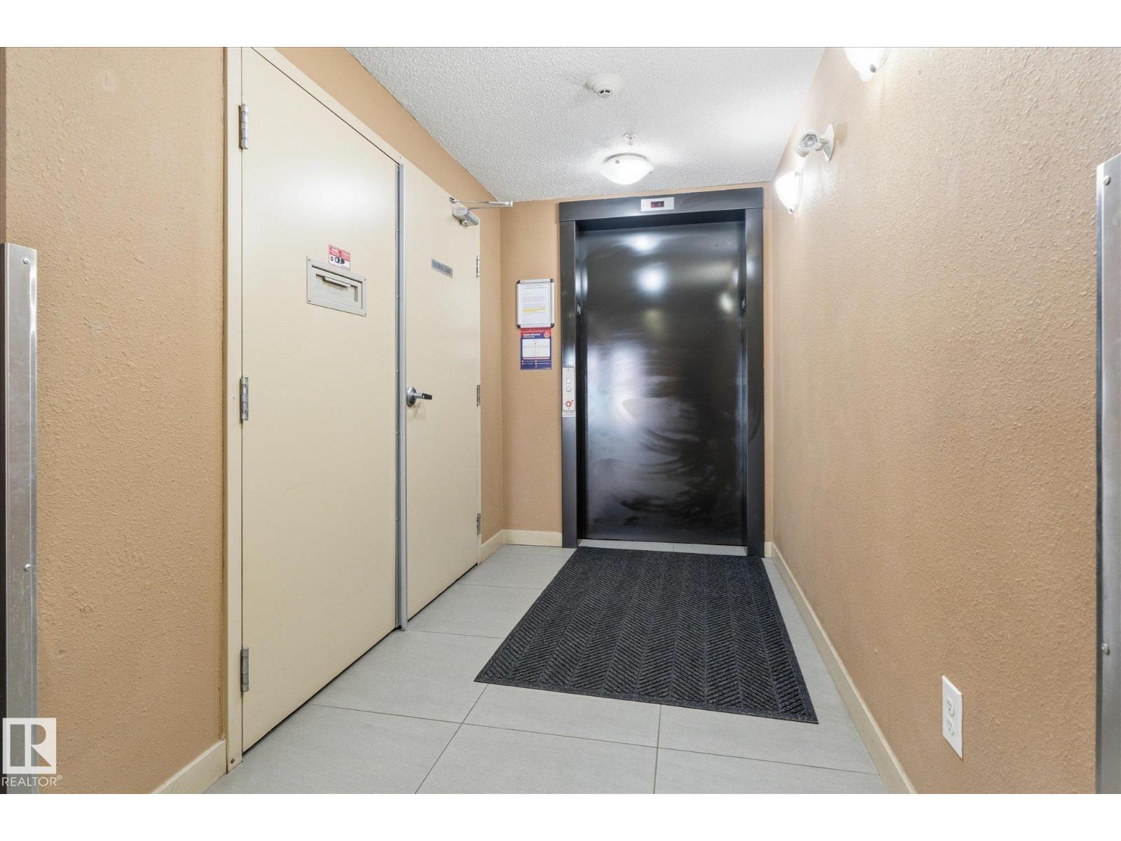 #208 1080 MCCONACHIE BV NW — photo 39