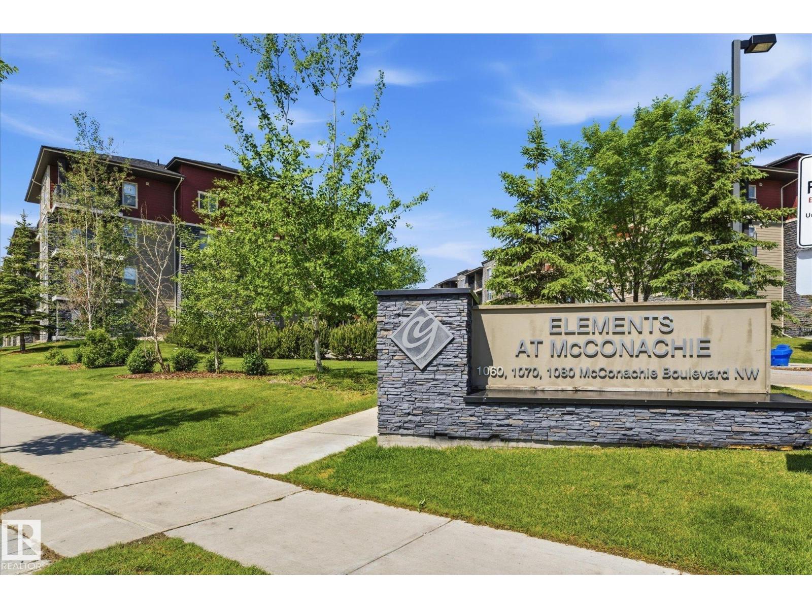 #208 1080 MCCONACHIE BV NW — photo 36