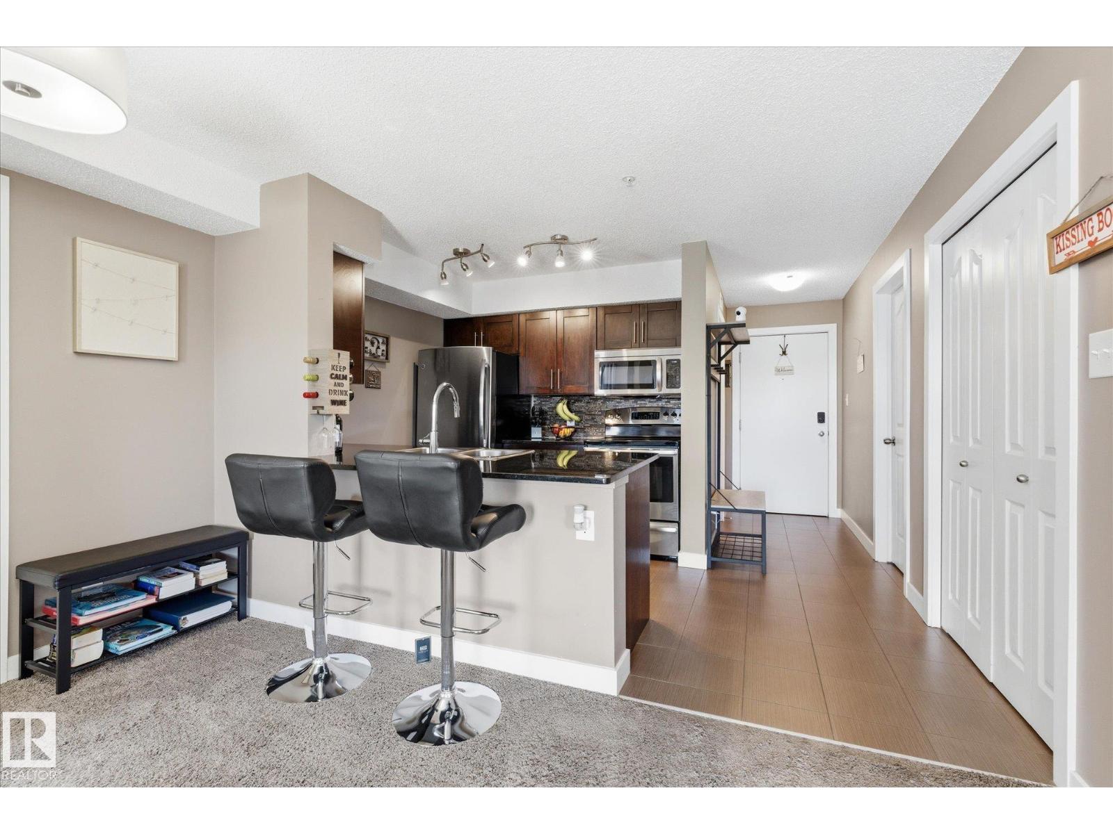 #208 1080 MCCONACHIE BV NW — photo 10