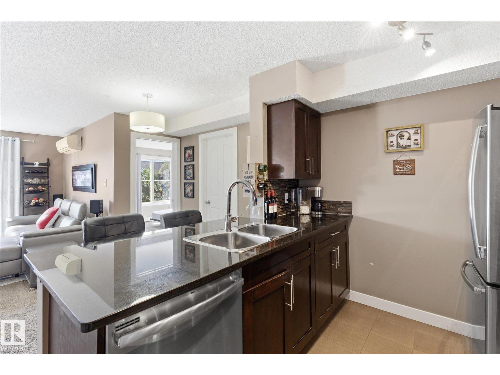 #208 1080 MCCONACHIE BV NW — photo 9
