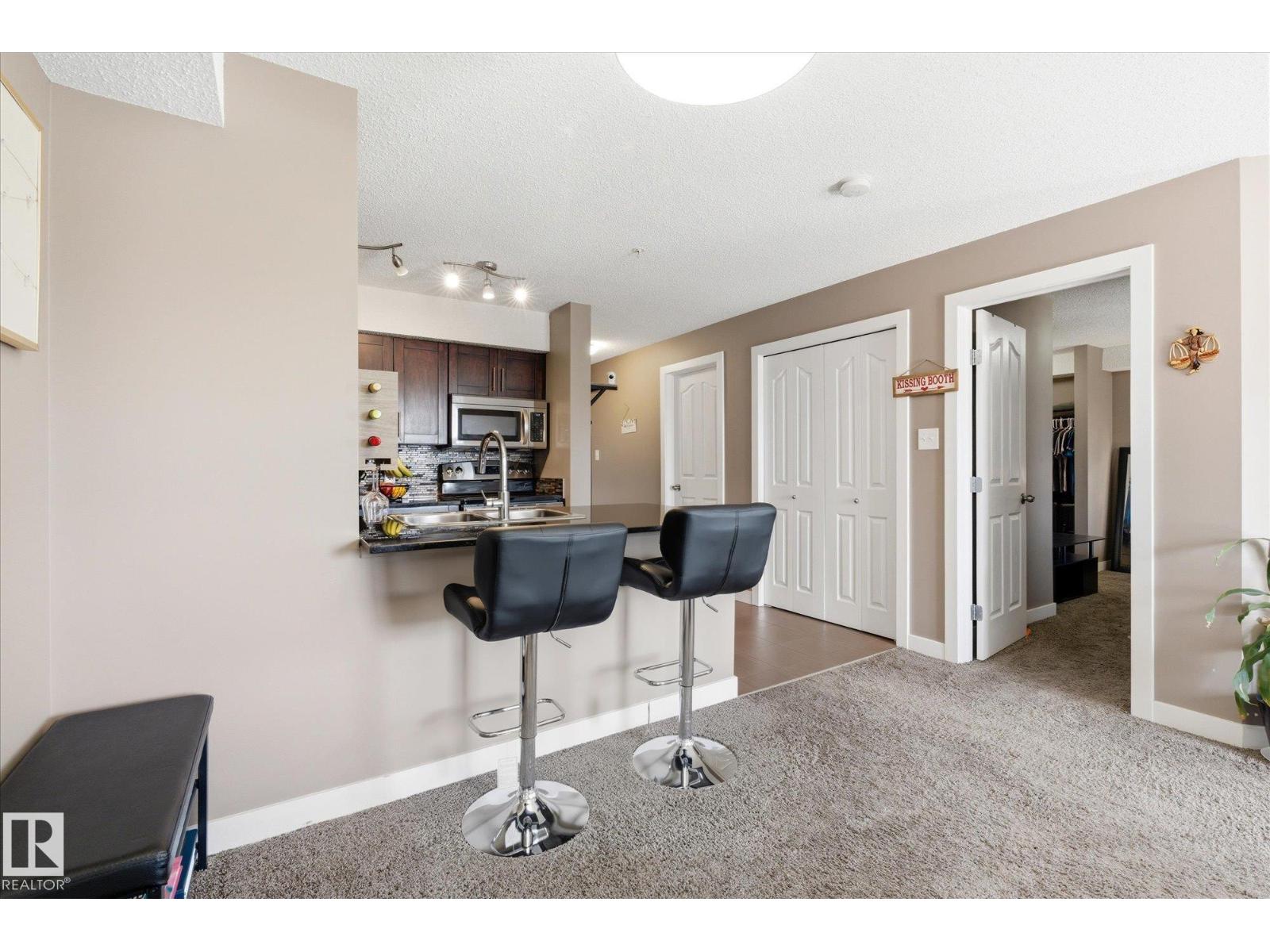 #208 1080 MCCONACHIE BV NW — photo 11