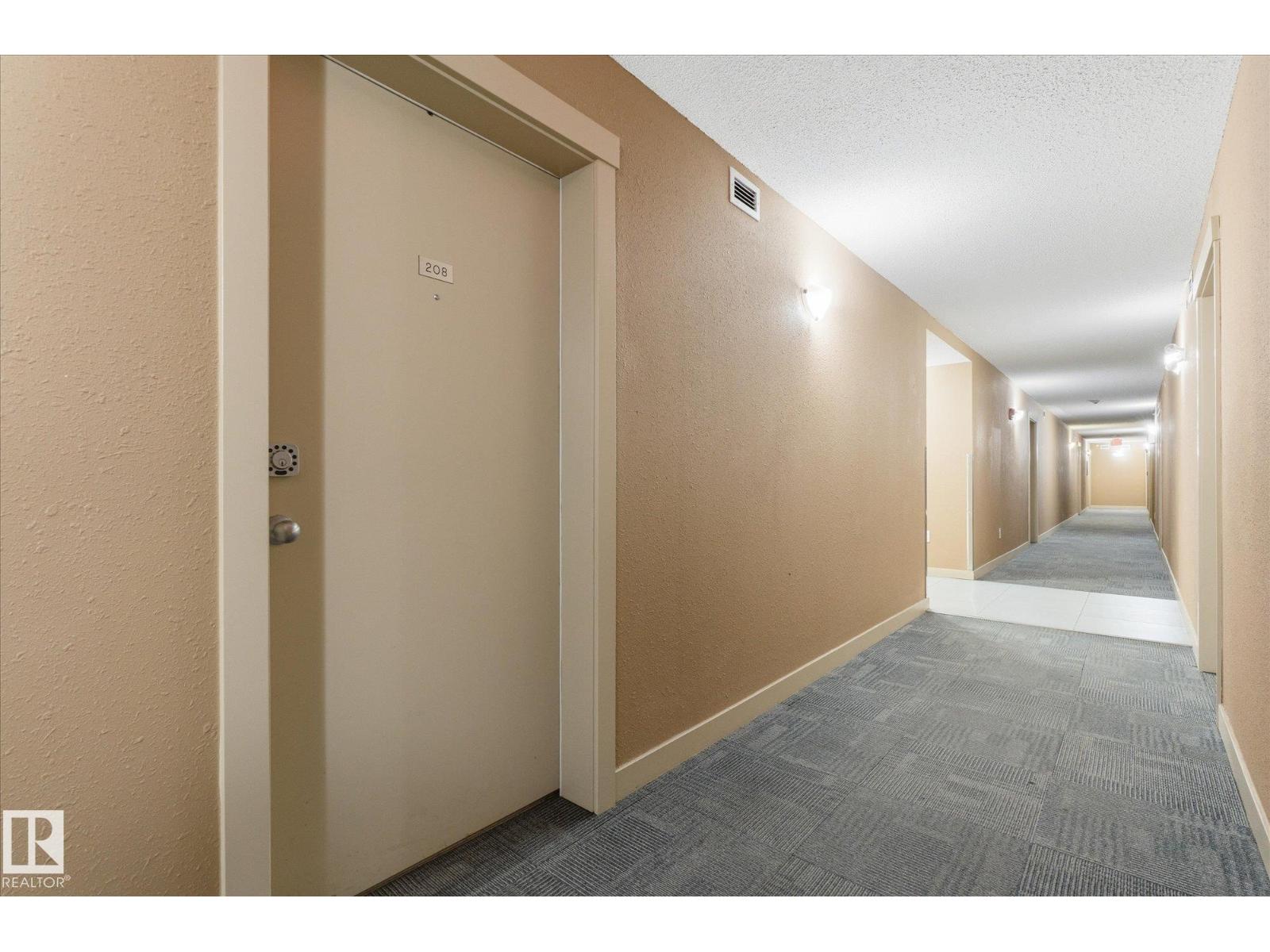 #208 1080 MCCONACHIE BV NW — photo 40