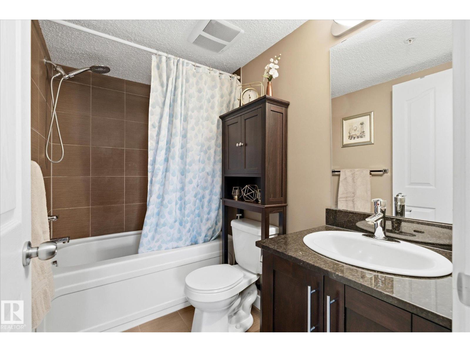 #208 1080 MCCONACHIE BV NW — photo 21