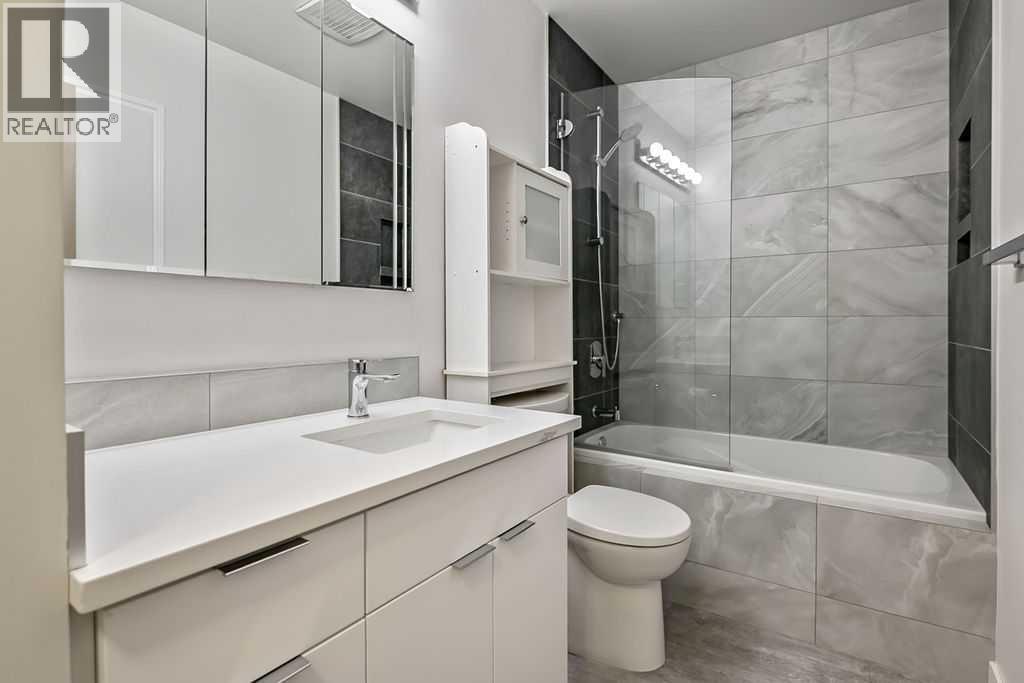 Thoughtfully renovated, this stylish bathroom combines everyday functionality with timeless design