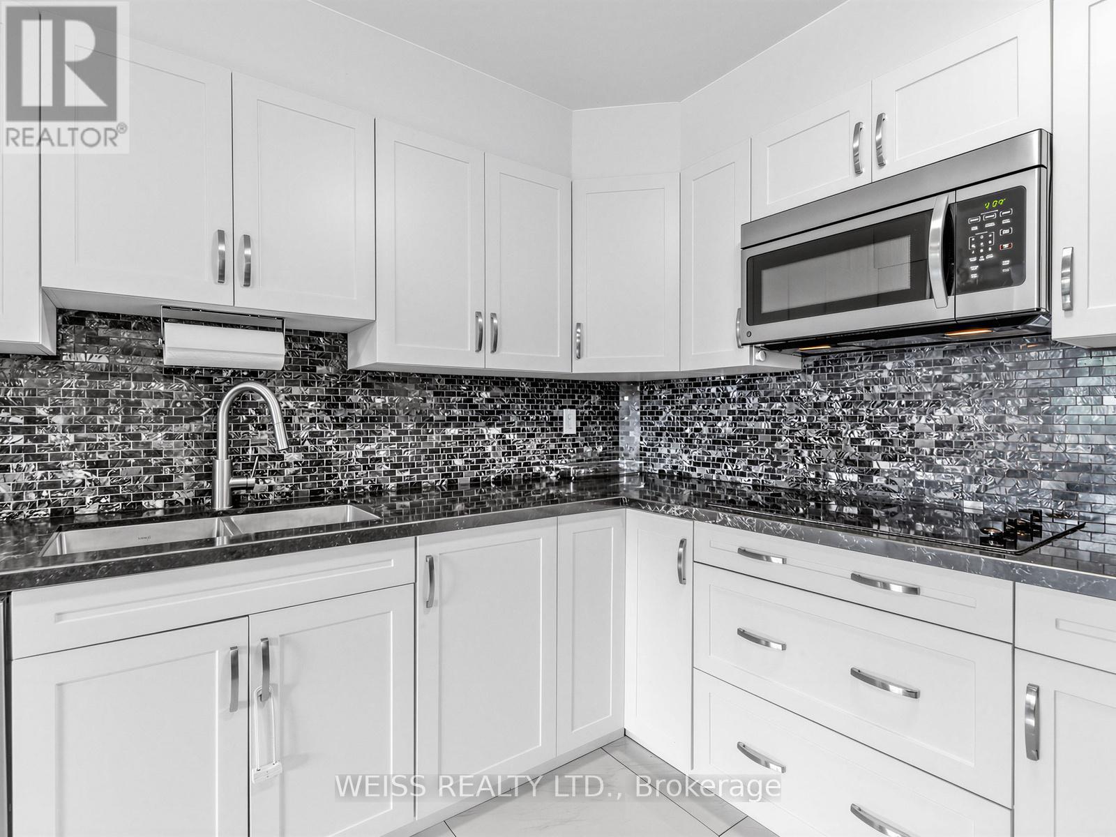 #202 150 NEPTUNE DRIVE - 6