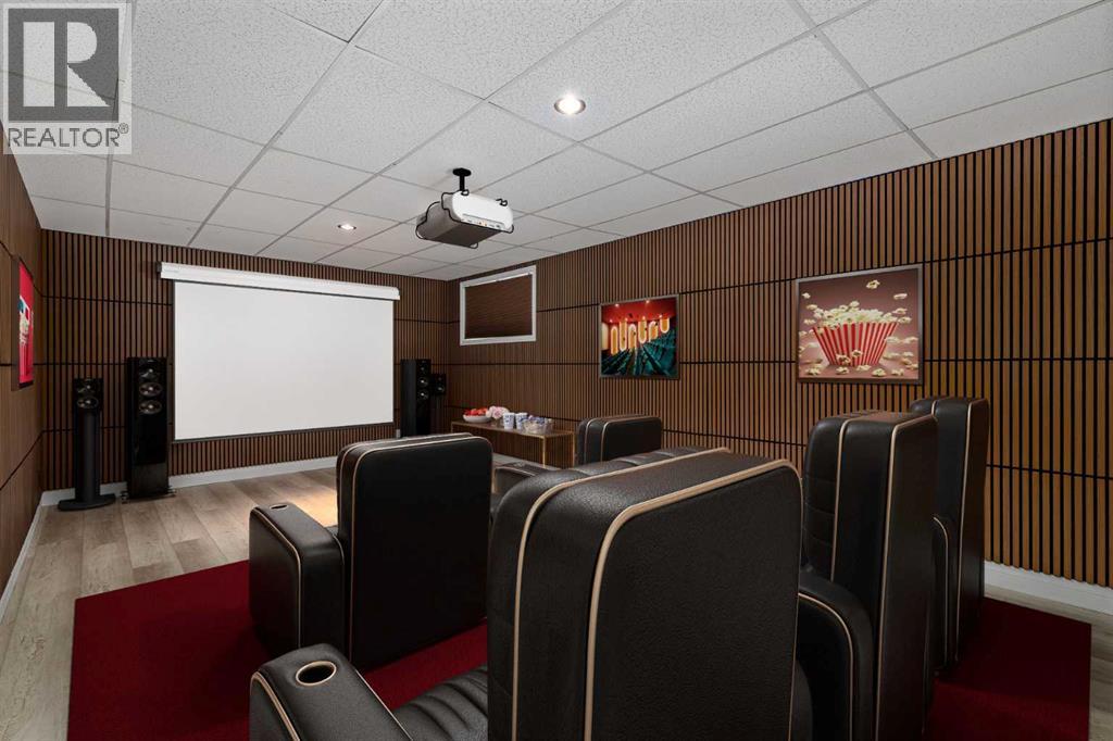 The theatre room has been completely redone with new sound-absorbing paneling  (virtually staged)