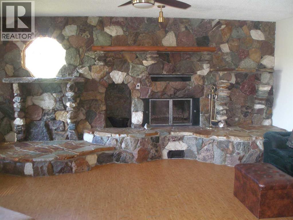 Rock wall, wood fireplace