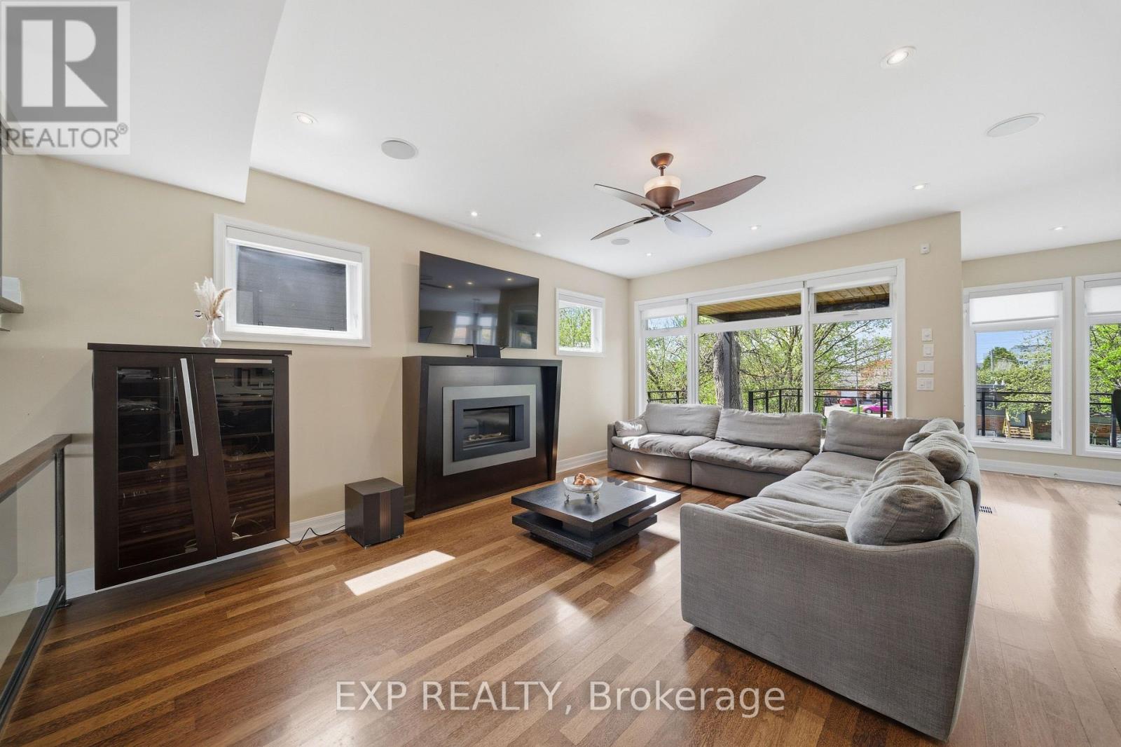 Fireplace and floor to ceiling windows