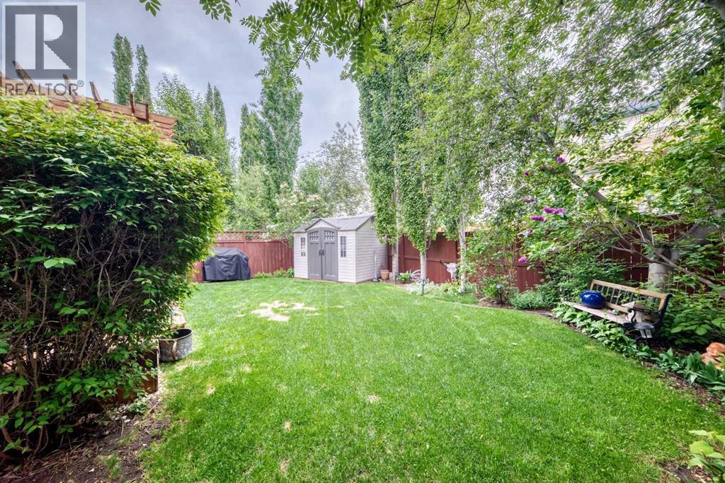 Beautifully Landscaped + Private Backyard