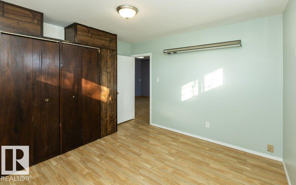 9836 100 ST - 21