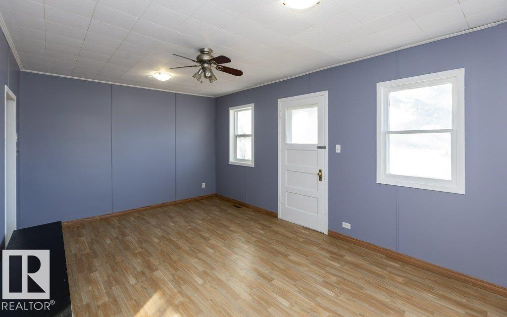 9836 100 ST - 7