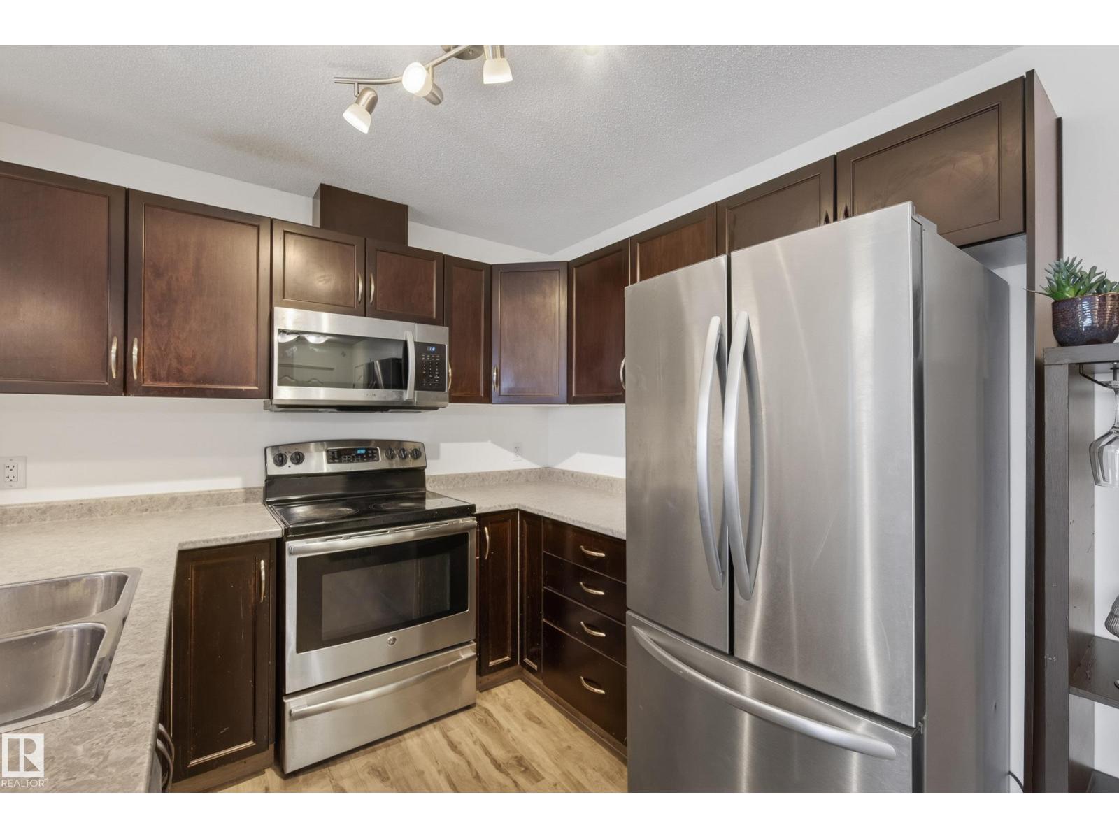 #414 5951 165 AV NW — photo 19