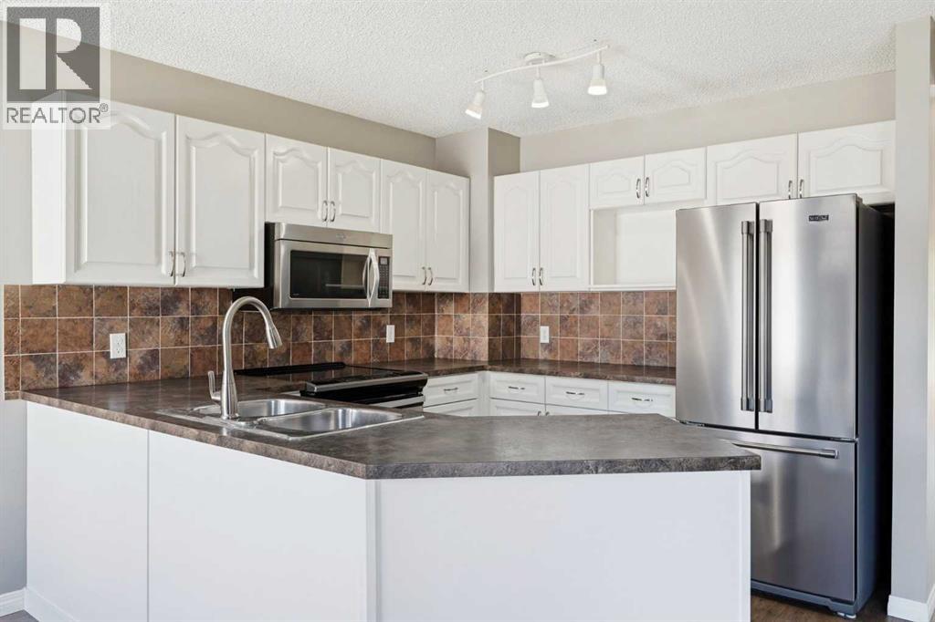 Kitchen with updated Maytag and Whirlpool  appliances