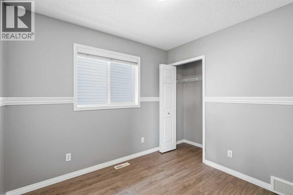 Third bedroom with a walk in closet; could be used as a guest bed, office or kids room