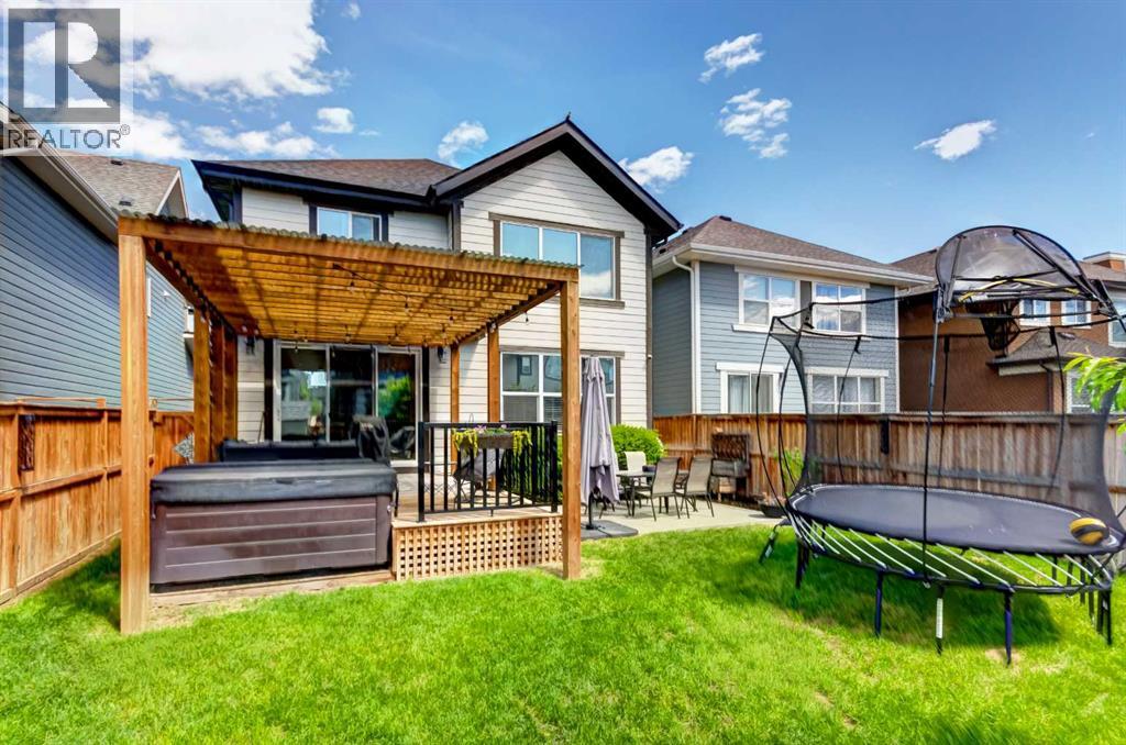 Backyard with pergola and hot tub