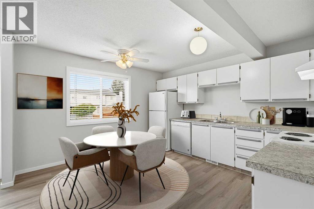 Kitchen and dining area - virtually staged