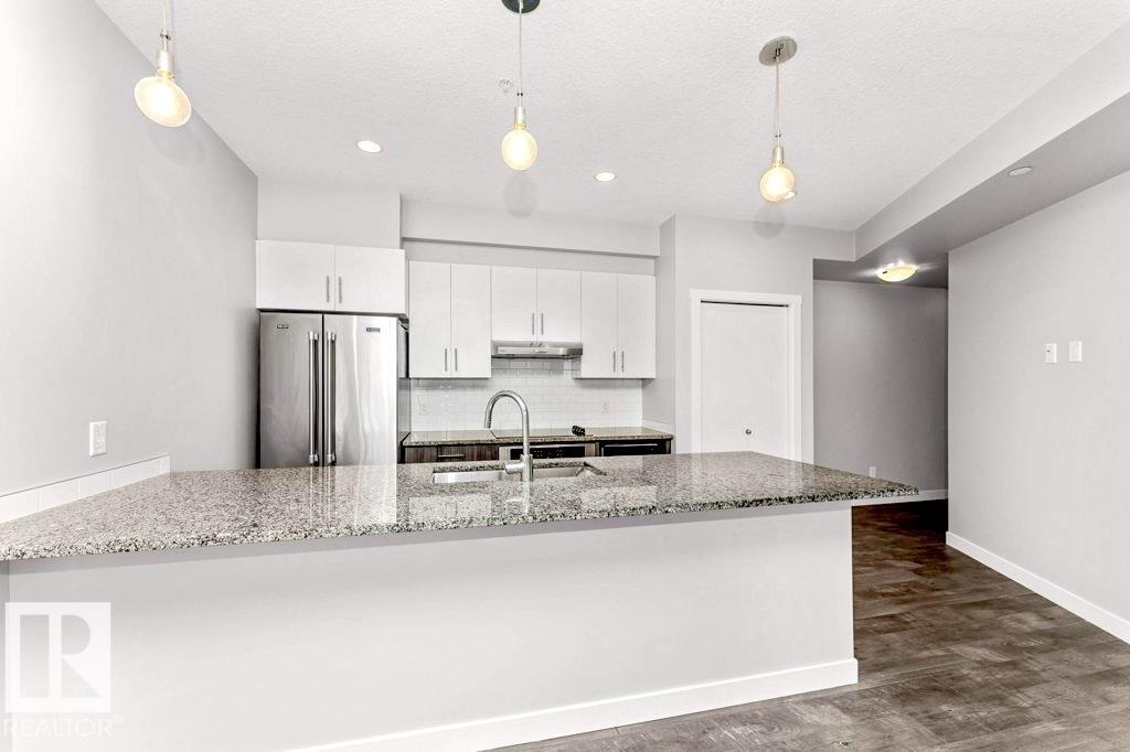 #204 10126 144 ST NW - 1