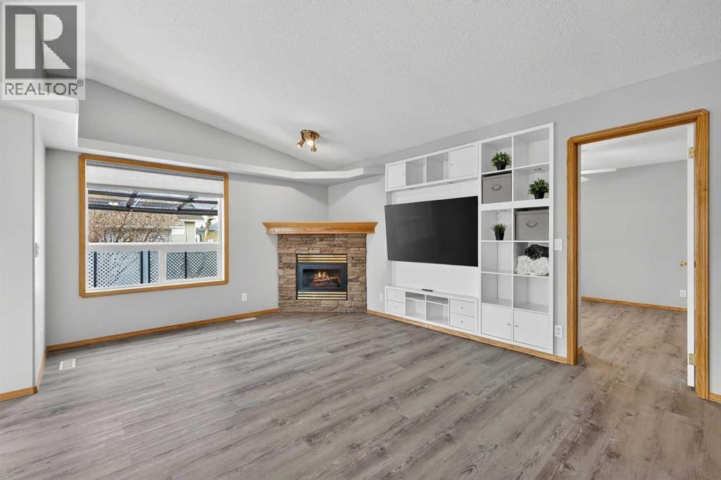 Inviting living room with fireplace and custom built-ins