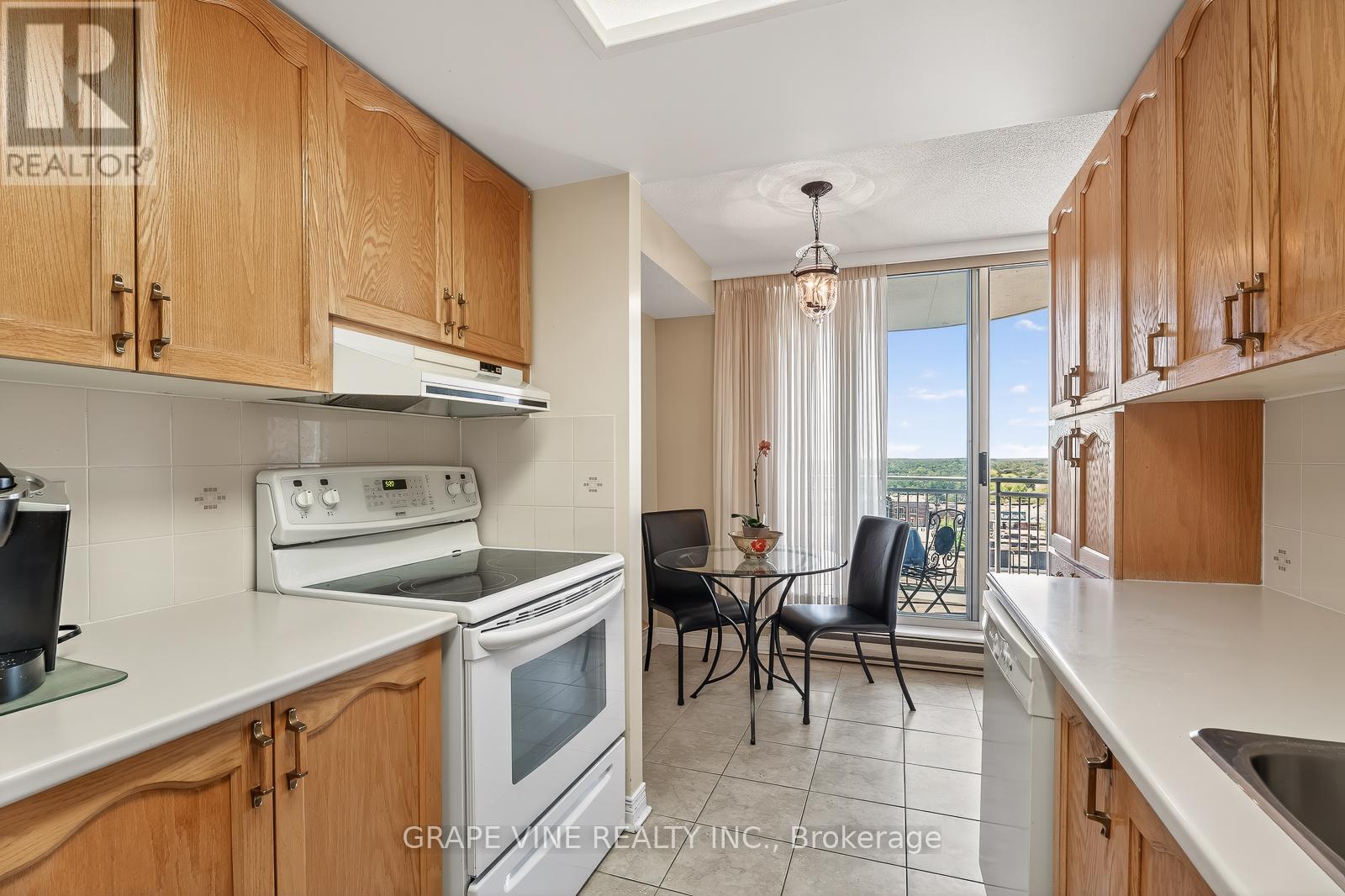 #1115 100 GRANT CARMAN DRIVE - 12