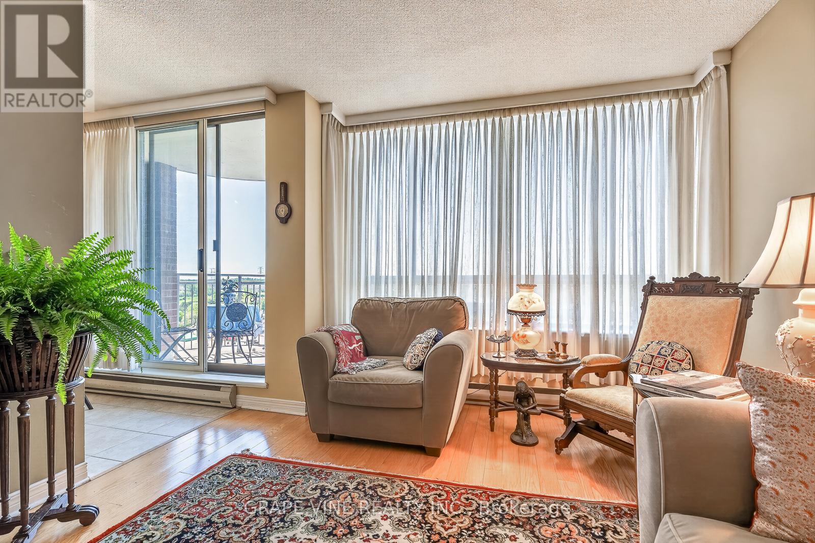 #1115 100 GRANT CARMAN DRIVE - 24