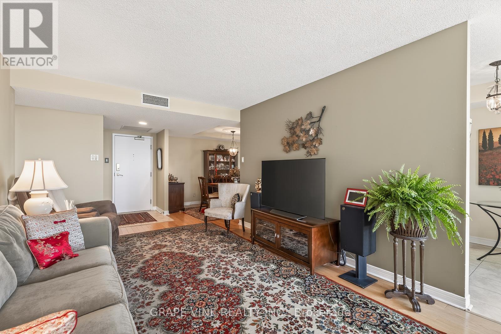 #1115 100 GRANT CARMAN DRIVE - 25