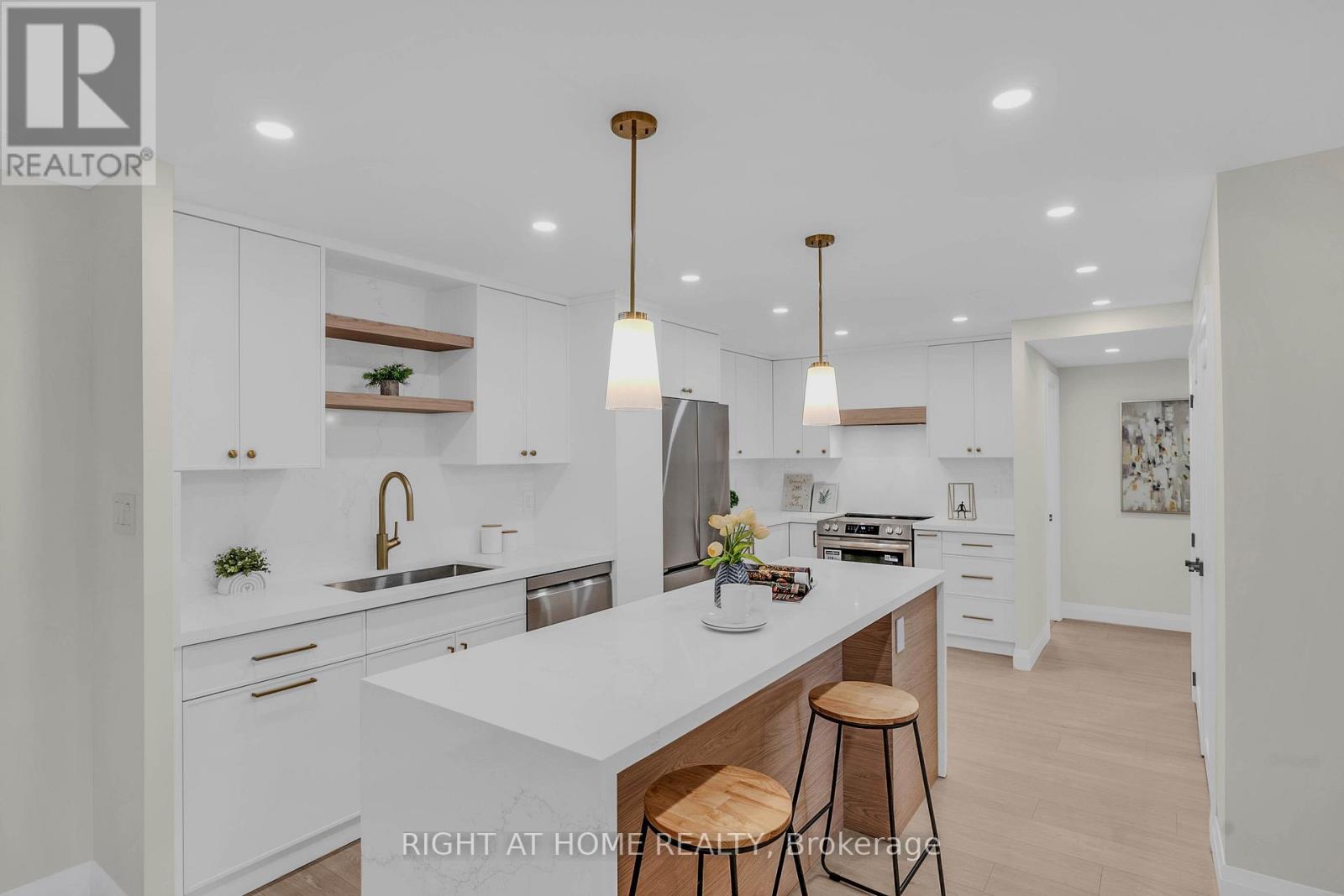 Custom kitchen w/ quartz counter and backsplash