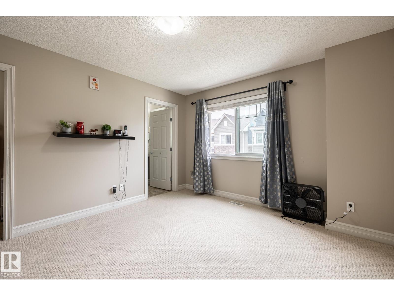 #59 655 TAMARACK RD NW - 24