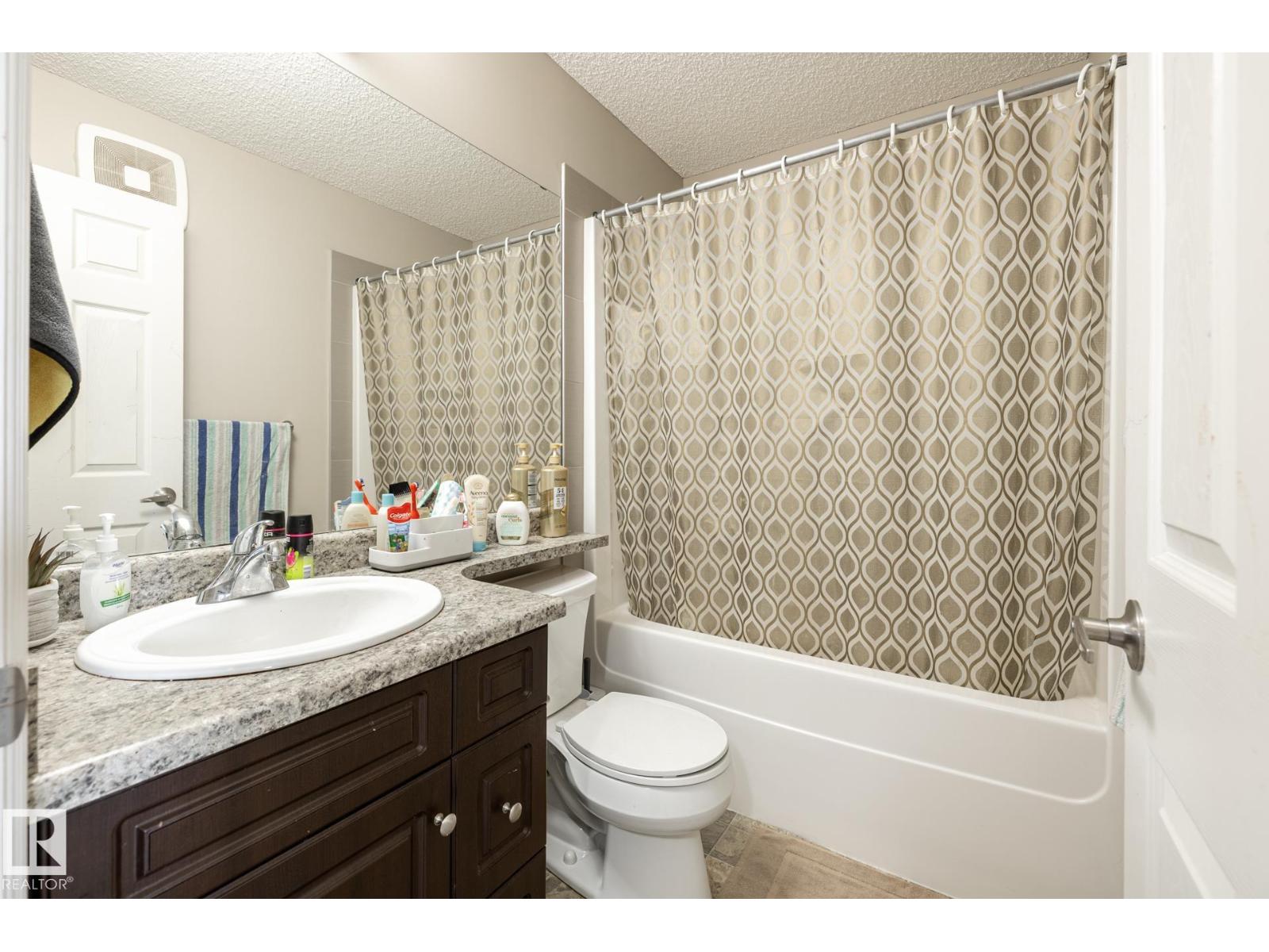 #59 655 TAMARACK RD NW - 34