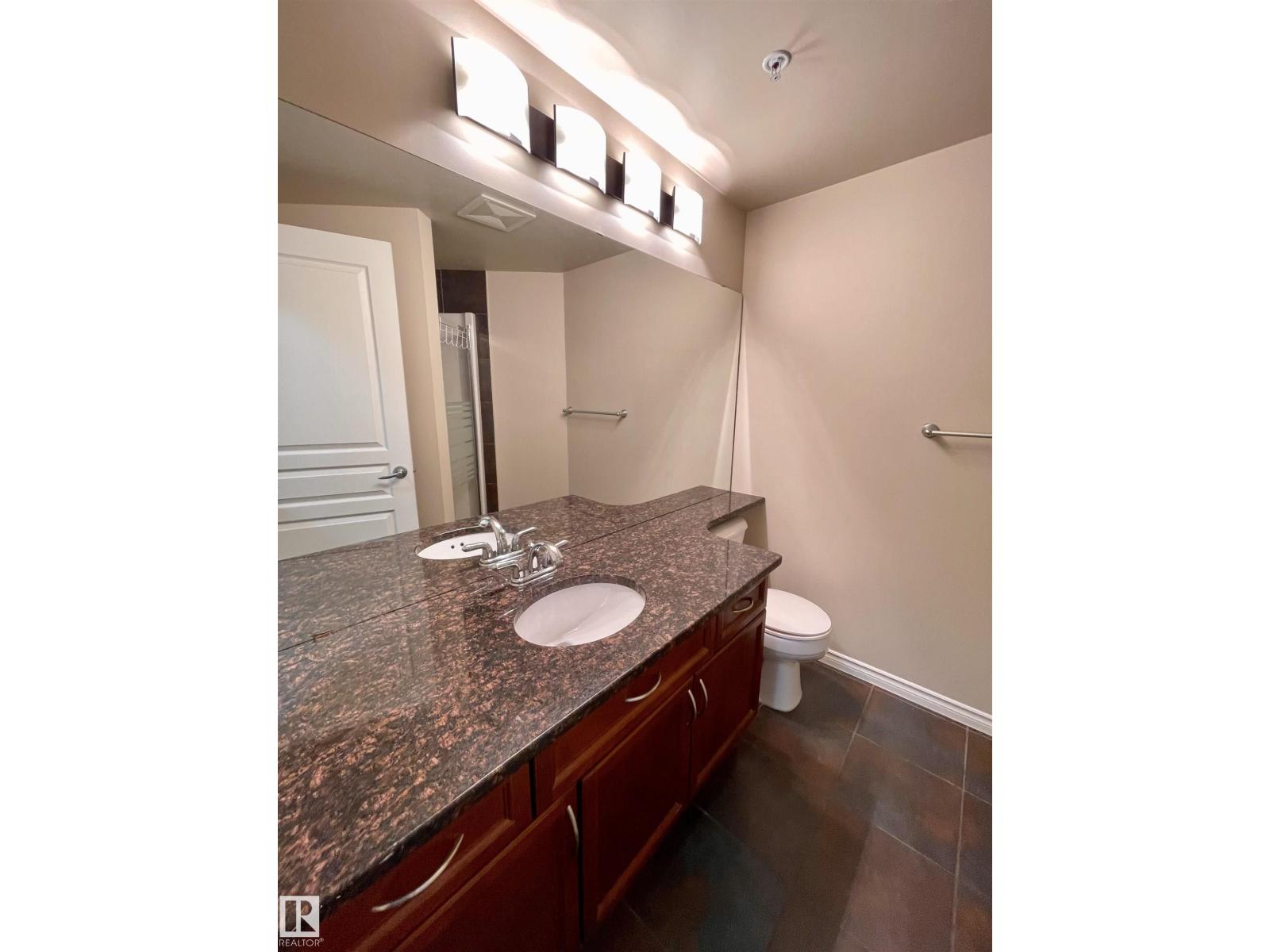 #205 9707 106 ST NW - 8
