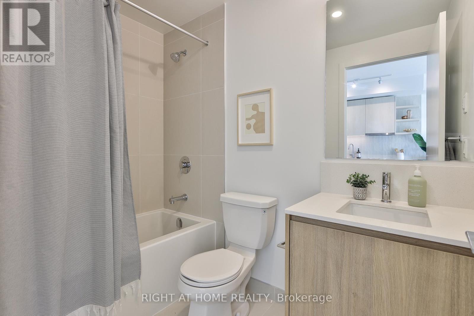 #205 1161 KINGSTON ROAD - 24