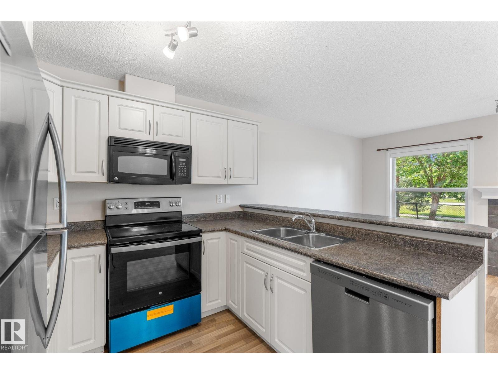 #67 15 WOODSMERE — photo 9