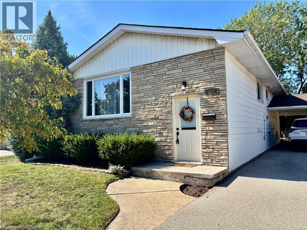 Easy care front yard with Carport and 4 driveway spaces
