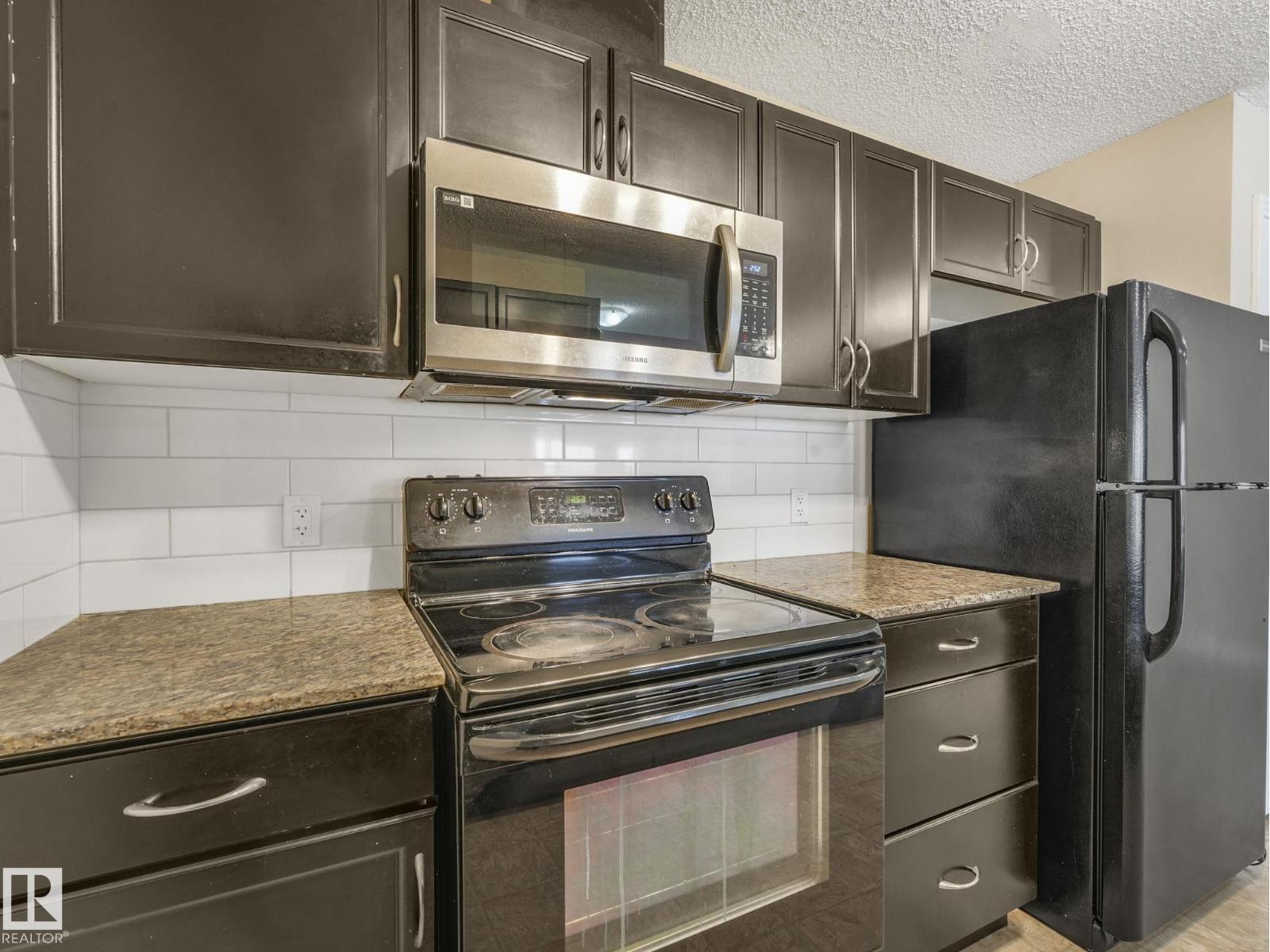 #317 12650 142 AV NW - 11