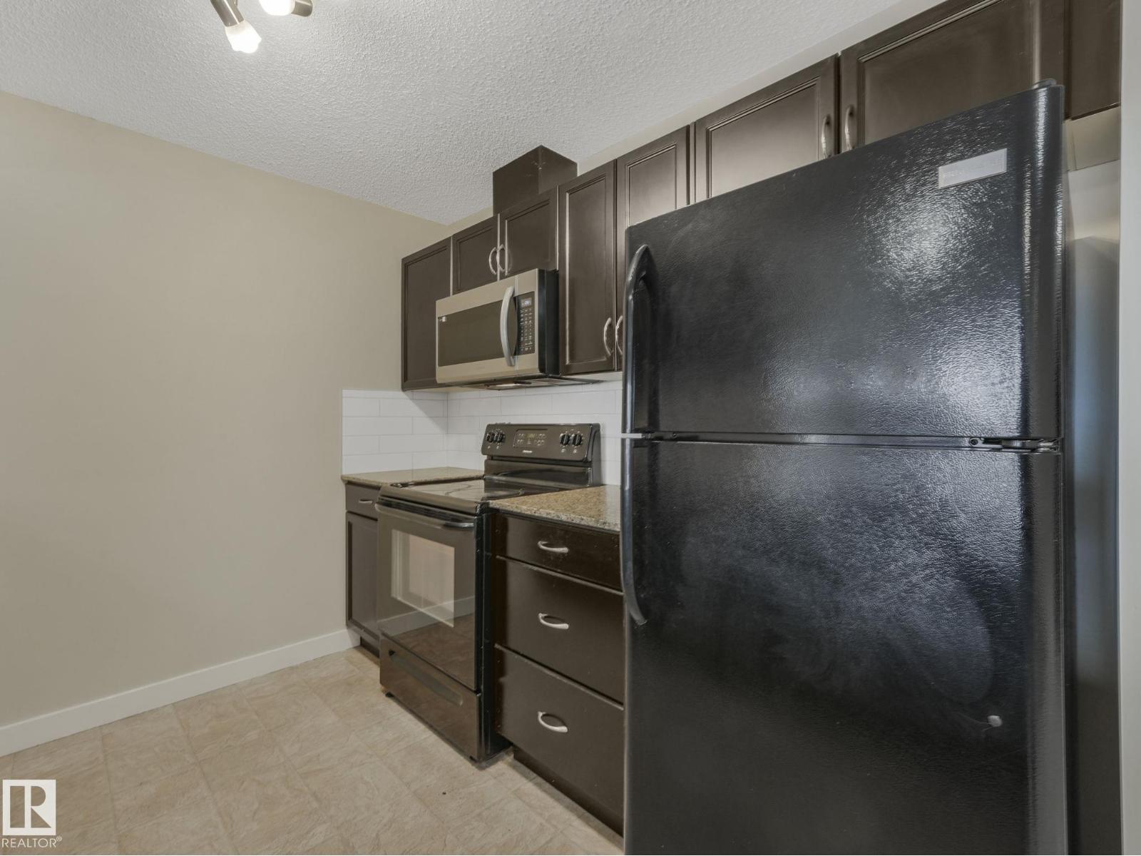 #317 12650 142 AV NW - 9