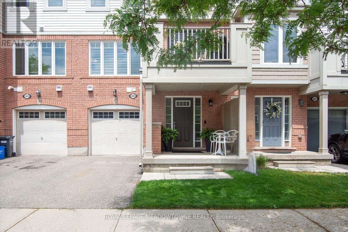 curb appeal with maicured lawn