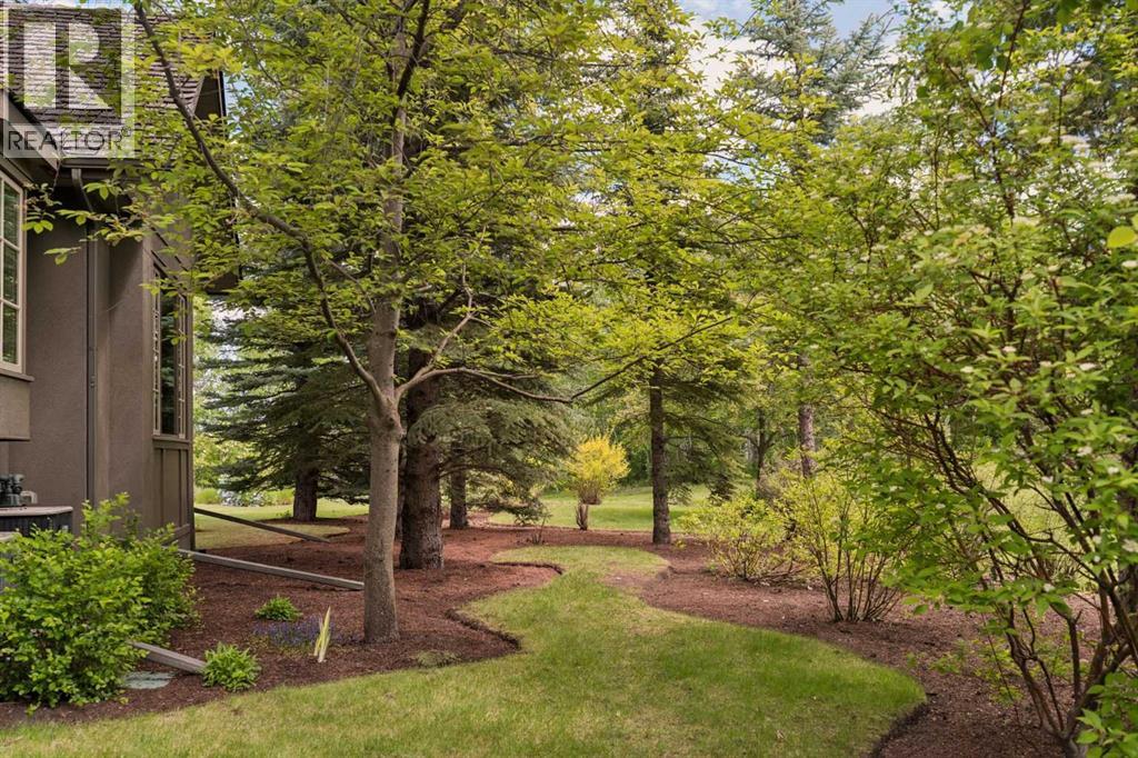 Beautifully landscaped grounds on all sides of property